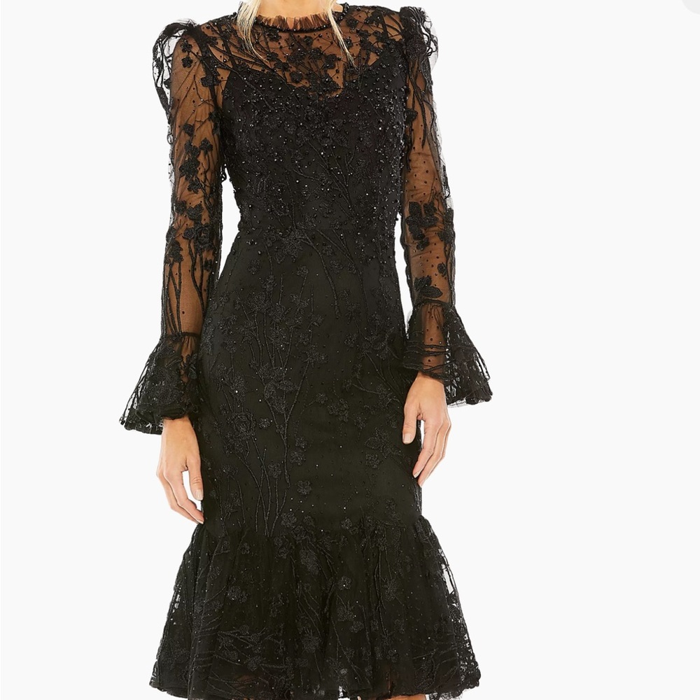 Disigner Mac Duggal, size 18, lace and beaded black dress.